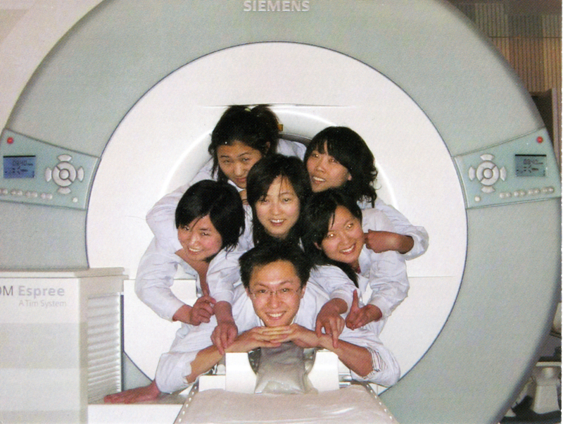 Dr. Chao and members of his staff pile into an open MRI machine to show the size of the space. SOURCE SUBMITTED